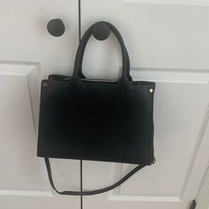 Black leather purse with strap